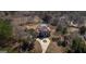High angle view of the brick home with the large front yard and circular driveway at 1408 Hemphill Rd, Stockbridge, GA 30281