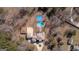 An aerial view of the pool and the basketball court in the backyard of this lovely home at 1408 Hemphill Rd, Stockbridge, GA 30281