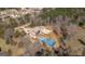Expansive estate with a private pool and basketball court surrounded by lush greenery at 1408 Hemphill Rd, Stockbridge, GA 30281