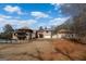 Large backyard with a beautiful home, inground pool, outbuilding, and privacy fence at 1408 Hemphill Rd, Stockbridge, GA 30281
