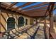 Covered balcony with stunning views and beautiful wood detail at 1408 Hemphill Rd, Stockbridge, GA 30281