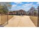 Elegant, multi-story home featuring a circular driveway with fountain, manicured landscaping, and a grand entrance at 1408 Hemphill Rd, Stockbridge, GA 30281