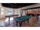 The recreational space features a pool table, shuffle board, and lounging area at 1408 Hemphill Rd, Stockbridge, GA 30281