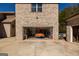 Two-car garage with a sports car parked inside, with ample room for storage at 1408 Hemphill Rd, Stockbridge, GA 30281