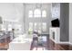 Bright living room boasts soaring ceilings, modern fireplace and opens to the kitchen at 1408 Hemphill Rd, Stockbridge, GA 30281