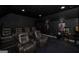 A state-of-the-art home theater with plush seating and immersive sound system at 1408 Hemphill Rd, Stockbridge, GA 30281