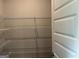 A well-organized closet with white wire shelving offers ample storage space at 5311 Tuscany Dr # 98 Plapprox Sqft, Douglasville, GA 30135
