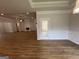 Open-concept living space with hardwood floors, fireplace, and natural light at 5311 Tuscany Dr # 98 Plapprox Sqft, Douglasville, GA 30135