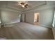 Expansive main bedroom features tray ceilings, recessed lighting, plush carpet and access to the Primary bath at 5311 Tuscany Dr # 98 Plapprox Sqft, Douglasville, GA 30135