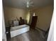 Bathroom remodel in progress with a dropped bathtub, toilet, and a sink cabinet at 1721 Lisbon Sw Dr, Atlanta, GA 30310
