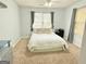 Bedroom featuring carpet, a bed, a ceiling fan, and a window with natural light at 235 Windcroft, Acworth, GA 30101