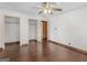 Bedroom includes hardwood floors, two closets, and ceiling fan with a light at 1713 Bramlett Shoals Rd, Lawrenceville, GA 30045