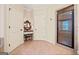 Bathroom featuring tile floors, vanity table, walk-in shower, and multiple doorways at 130 Staddlebridge Ave, Canton, GA 30114