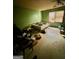 This bedroom shows signs of disrepair and clutter, needing renovation to enhance comfort at 3210 Rogers Rd, Mcdonough, GA 30252