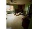 The bedroom showing disrepair and clutter, would benefit from a full renovation at 3210 Rogers Rd, Mcdonough, GA 30252