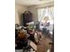 Bedroom requiring renovation featuring a dark interior and outdated furnishings at 3210 Rogers Rd, Mcdonough, GA 30252