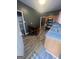Charming kitchen with dark gray walls, wooden cabinets, and stainless steel appliances, creating a modern and functional space at 1528 Olympian Sw Way, Atlanta, GA 30310