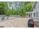 Stone patio featuring an outdoor seating area and view of the pool at 105 Oak Leaf Ct, Fayetteville, GA 30214