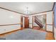 Dining room featuring hardwood floors and traditional chandelier lighting at 105 Oak Leaf Ct, Fayetteville, GA 30214