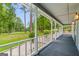 Exterior view of covered front porch with view of front yard at 105 Oak Leaf Ct, Fayetteville, GA 30214