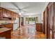 Spacious kitchen with tile floors, ceiling fan, and breakfast nook overlooking pool at 105 Oak Leaf Ct, Fayetteville, GA 30214