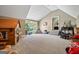 Bright and airy playroom featuring ample space, a playhouse, and large windows for natural light at 4185 Etcetera Ln, Cumming, GA 30041