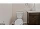 Powder room featuring dark cabinets and a modern sink at 309 Coral Cir, Mcdonough, GA 30253