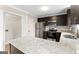 Modern kitchen with stainless appliances and dark cabinets at 309 Coral Cir, Mcdonough, GA 30253
