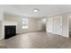 Bright living room with a fireplace and neutral walls at 309 Coral Cir, Mcdonough, GA 30253