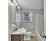 Bathroom showing vanity, lighting, shower and tub combination at 6198 Rocky Creek Dr, Douglasville, GA 30135