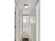 Hallway with multiple doors leading to various rooms at 6198 Rocky Creek Dr, Douglasville, GA 30135