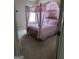 Bedroom with a frilly pink canopy bed at 1186 Diamond Crossing, Mcdonough, GA 30252