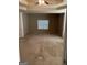 Spacious bedroom featuring a tray ceiling, ceiling fan, and a window for natural light at 1186 Diamond Xing, Mcdonough, GA 30252