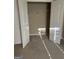 Empty carpeted closet showcasing a wire shelving system and a door at 1186 Diamond Xing, Mcdonough, GA 30252