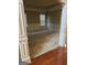 Elegant dining room with classic trim, plush carpet, and a charming chandelier fixture at 1186 Diamond Xing, Mcdonough, GA 30252