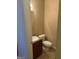 Convenient half bathroom featuring a pedestal sink and tiled floor at 1186 Diamond Xing, Mcdonough, GA 30252