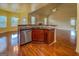 Eat-in kitchen with stainless steel dishwasher and breakfast bar at 1186 Diamond Xing, Mcdonough, GA 30252