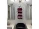 A detailed close-up bathroom featuring double vanity mirrors, decorative towels, and a sleek faucet design at 2978 Parc Lorraine # Building 4, Lithonia, GA 30038