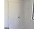 Neutral room with a closed white door, a window with natural light, and fresh paint at 2978 Parc Lorraine # Building 4, Lithonia, GA 30038