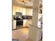 Well-lit kitchen featuring stainless steel appliances, white cabinetry, and a breakfast bar at 300 Legacy Ln, Peachtree City, GA 30269