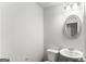 Powder room with standard toilet and sink at 425 Camella Cir # 90, Mcdonough, GA 30252