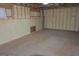 Unfinished basement showing spray foam insulation and concrete flooring at 195 Twin Oaks Dr, Hampton, GA 30228