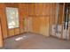 Unfinished basement walls feature spray foam insulation and a small window at 195 Twin Oaks Dr, Hampton, GA 30228