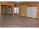 Unfinished basement with concrete floor, spray foam insulation, and a double door exit at 195 Twin Oaks Dr, Hampton, GA 30228