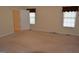 Clean and simple bedroom with neutral carpet and good natural light at 195 Twin Oaks Dr, Hampton, GA 30228