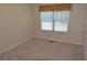 Cozy bedroom with carpet and a bright window with blinds at 195 Twin Oaks Dr, Hampton, GA 30228