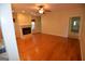 Spacious living room with hardwood floors and a fireplace, perfect for gatherings at 195 Twin Oaks Dr, Hampton, GA 30228