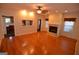 Bright living room with hardwood floors, fireplace, and great natural light at 195 Twin Oaks Dr, Hampton, GA 30228