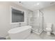 Bathroom features a standalone tub, a separate shower and updated fixtures at 3195 Tackett Rd, Douglasville, GA 30135