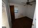 Compact bedroom showing a window, closet, and ceiling fan at 439 Oakside Sw Dr, Atlanta, GA 30331